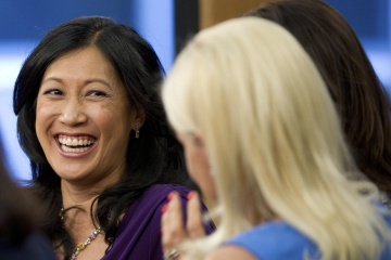Theresia Gouw Ranzetta, partner with Accel Partners, left, laughs during the taping of "Women To Watch Round Table" for Bloomberg Television in San Francisco on June 13, 2012.&nbsp; [time.com]