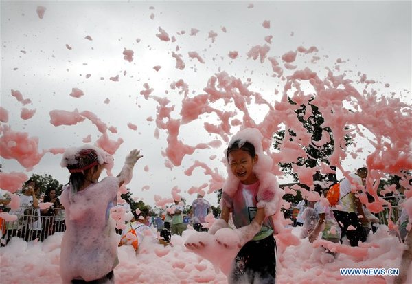 Children Play with Bubbles at Scenic Spot in SW China