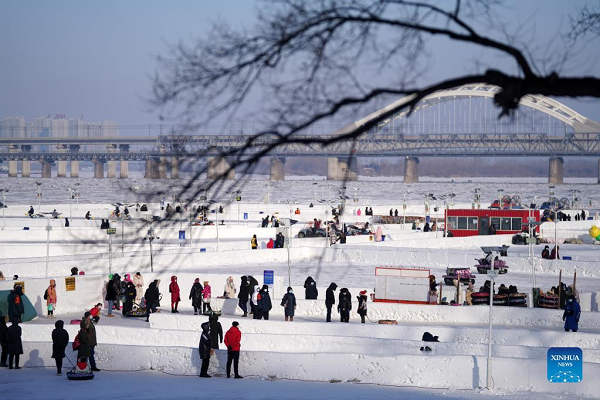 People Enjoy Ice-Snow Fun in Harbin