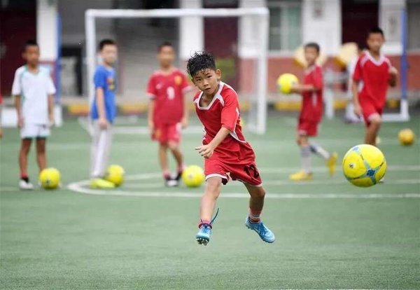 Small County in NW China Scores Big with Soccer