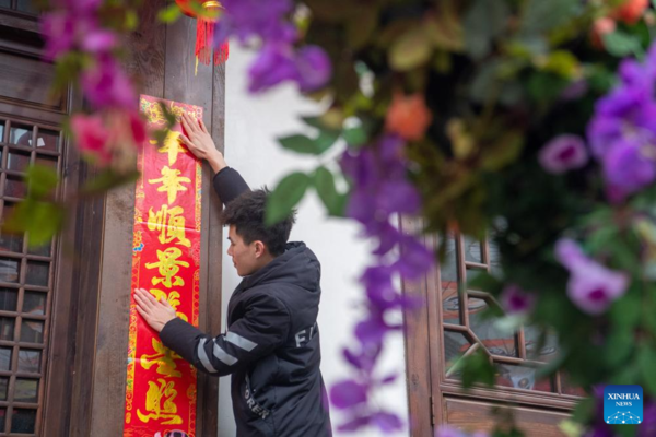 Decorations Set up to Celebrate Upcoming Spring Festival in Yongxi Ancient Town, SW China