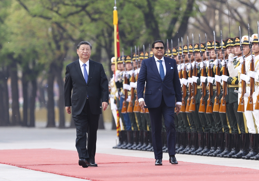 Xi Holds Talks with Surinamese President