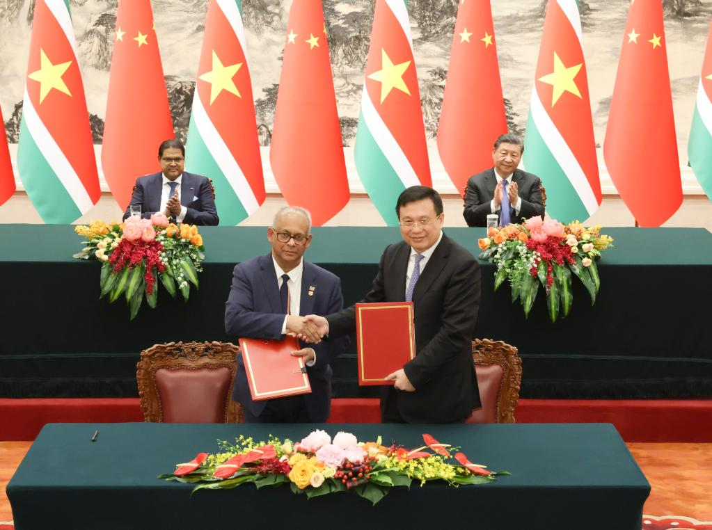 Xi Holds Talks with Surinamese President