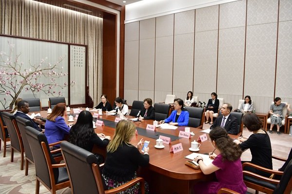 Huang Xiaowei Meets with President of the UN General Assembly