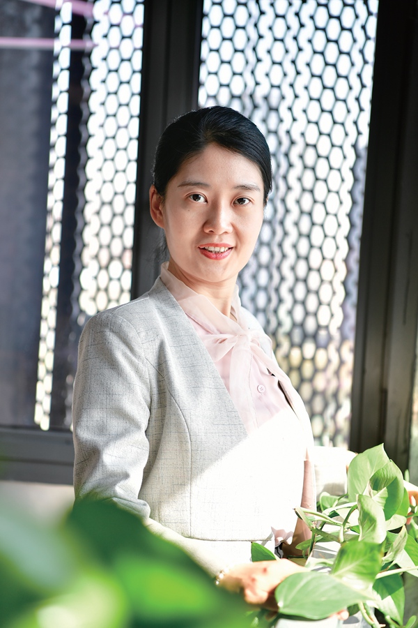 Young Woman Using Information Technologies to Transform China's Construction Industry