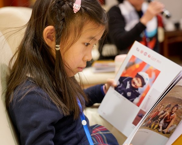 Photo Exhibition Featuring Family Shows Children's Talents