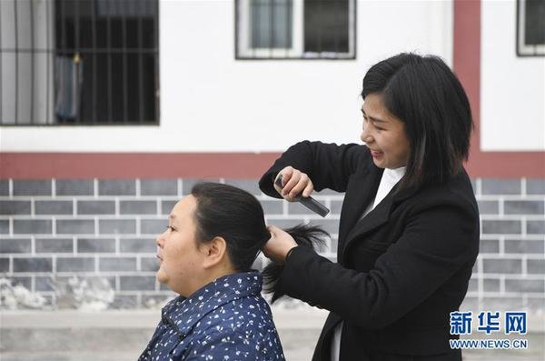 Woman Attendant Provides Considerate Nursing Services to Disabled Elderly
