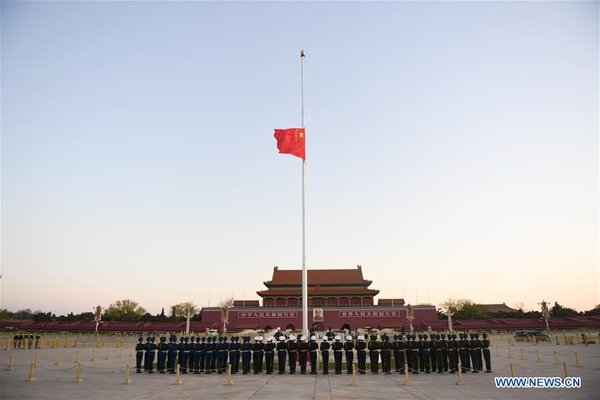 Chinese National Flag Flies at Half-Mast to Mourn for People Died in COVID-19 Fight