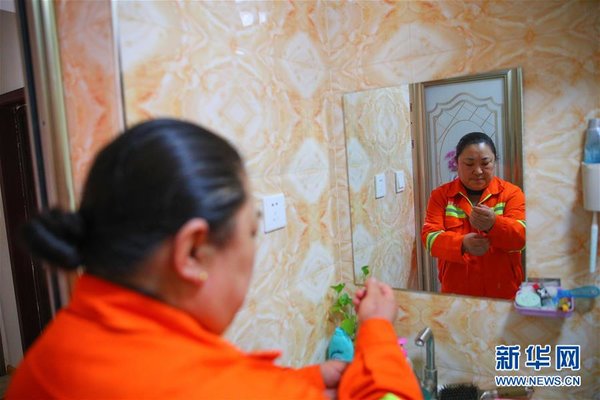 Female Cleaner Vows to Express Voices of the People During NPC Session