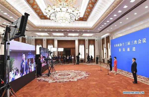 CPPCC Members Receive Interview Before Closing Meeting of Annual Session