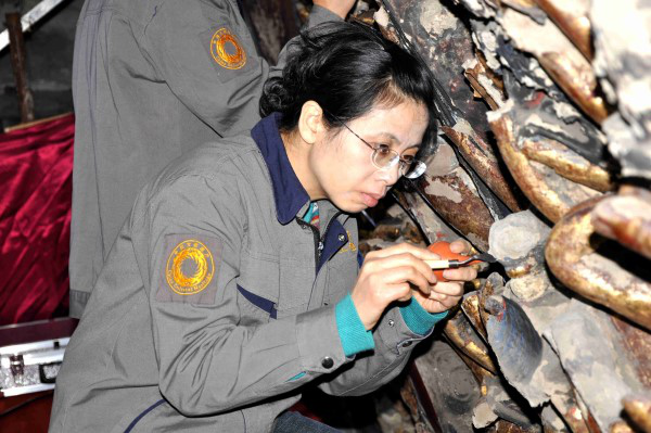 Woman Finds Self-Fulfillment in Restoring Cultural Relics