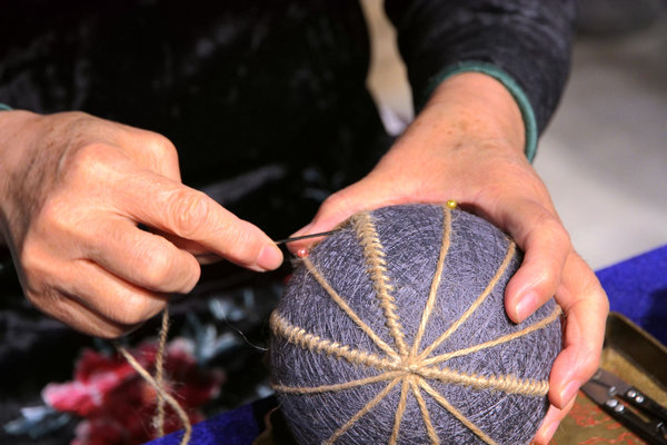 Woman Keeps Embroidered Cuju Skills Alive