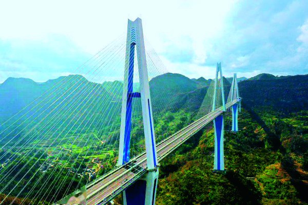 Amazing 'Rainbows' Across Steep Valleys — Engineer Leads Team in Building Bridge in Mountainous Guizhou