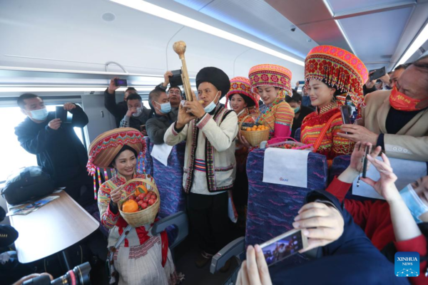 Remote Daliang Mountain in SW China Sees Departure of First Bullet Train