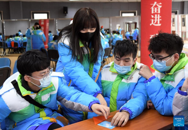 Volunteers for Beijing Olympics Attend Training Session to Develop Skills