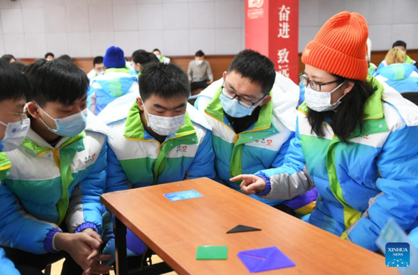 Volunteers for Beijing Olympics Attend Training Session to Develop Skills