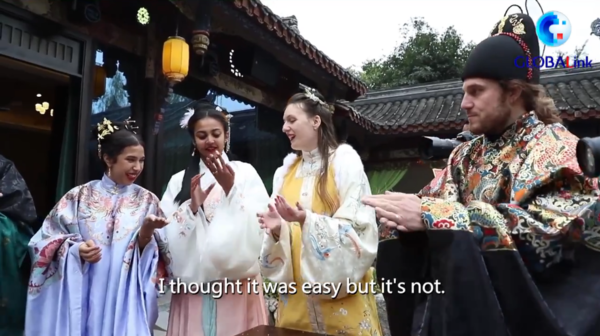GLOBALink | Wearing Hanfu, Expats Enjoy Chinese Lunar New Year Custom in China's Chongqing