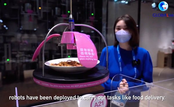 GLOBALink | Dishes Coming from Sky? Robot Chefs Serve at Beijing Olympic Winter Games