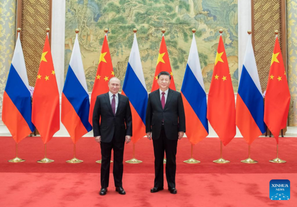President Xi Holds Talks with Putin