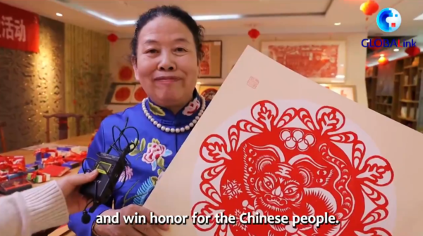 Paper-Cutting Artist in NW China Celebrates Lunar New Year, Winter Olympics