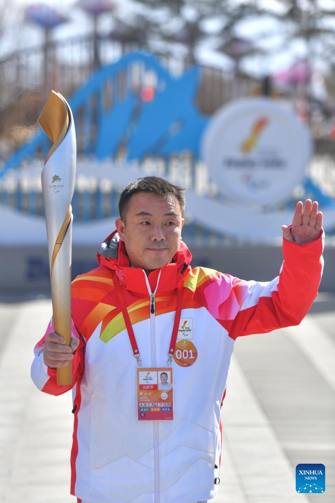 Winter Paralympic Torch Relay Held in Beijing's Olympic Forest Park