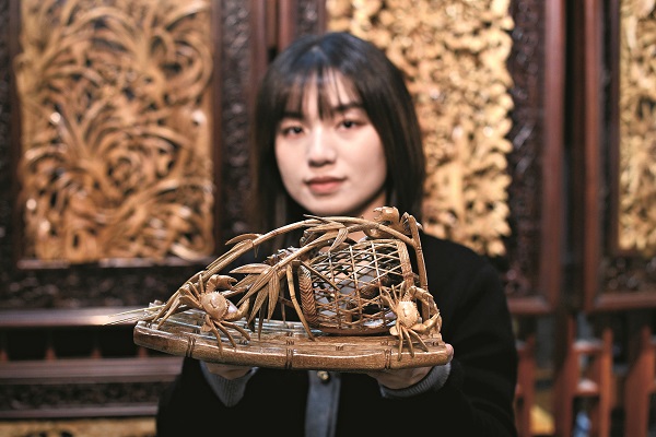 Young Craftswoman Breathes New Life into Wood Carvings