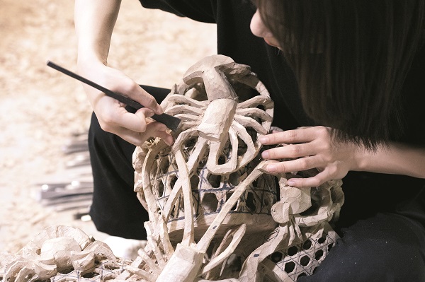 Young Craftswoman Breathes New Life into Wood Carvings