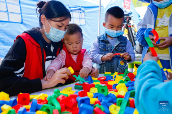 Children's Center Set up at Quake Relief Shelter in Luding County
