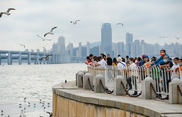 US, Japan and South Korea hold drills in disputed sea as Biden hosts leaders of Japan, Philippines