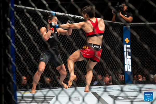 Zhang Regains UFC Strawweight Gold, Adesanya Dethroned