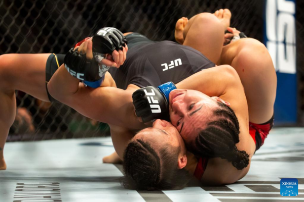 Zhang Regains UFC Strawweight Gold, Adesanya Dethroned