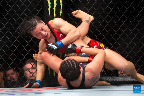 Zhang Regains UFC Strawweight Gold, Adesanya Dethroned