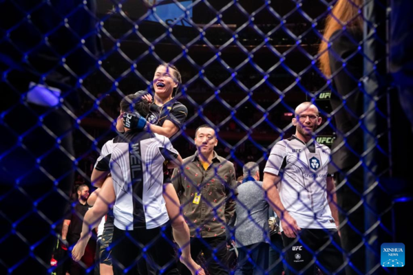 Zhang Regains UFC Strawweight Gold, Adesanya Dethroned