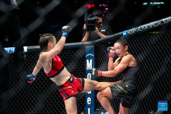 Zhang Regains UFC Strawweight Gold, Adesanya Dethroned