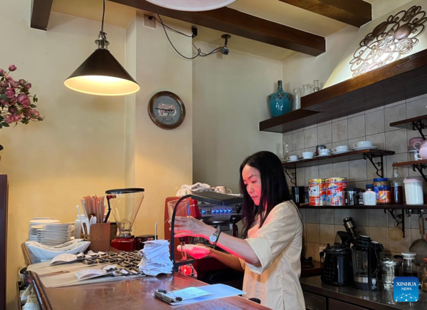 Across China: Coffee Aroma Evokes Fond Memories Among Returned Overseas Chinese