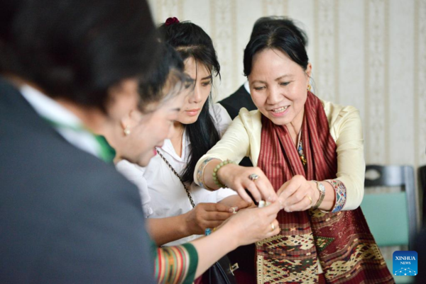 Alumni from '67' School Reunite at Chinese New Year Event in Laos