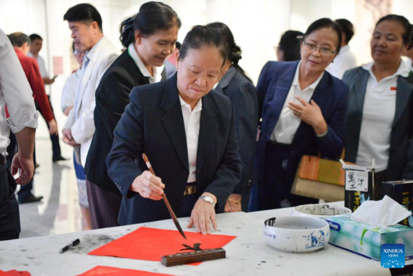 Alumni from '67' School Reunite at Chinese New Year Event in Laos