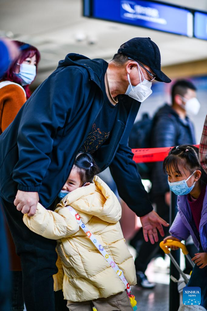 People on Their Way for Family Reunions During Spring Festival Travel Rush