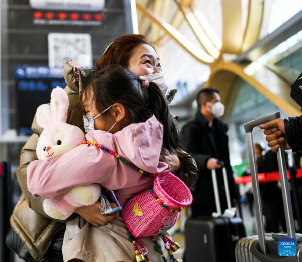 People on Their Way for Family Reunions During Spring Festival Travel Rush