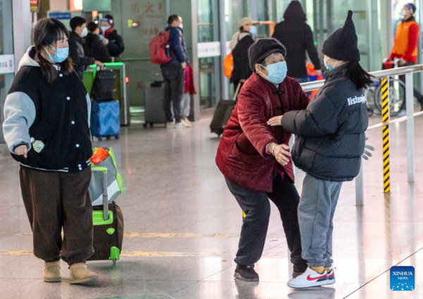 People on Their Way for Family Reunions During Spring Festival Travel Rush