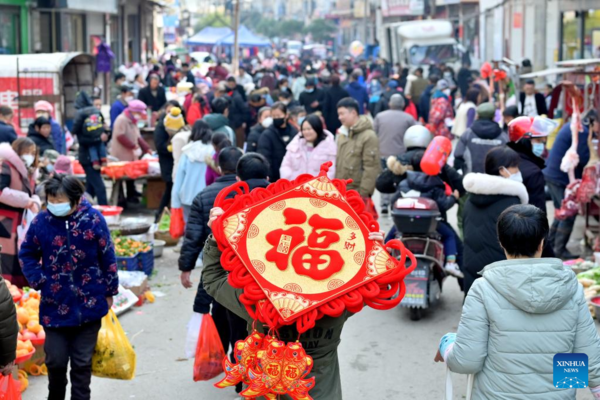 People Celebrate Upcoming Spring Festival Across China