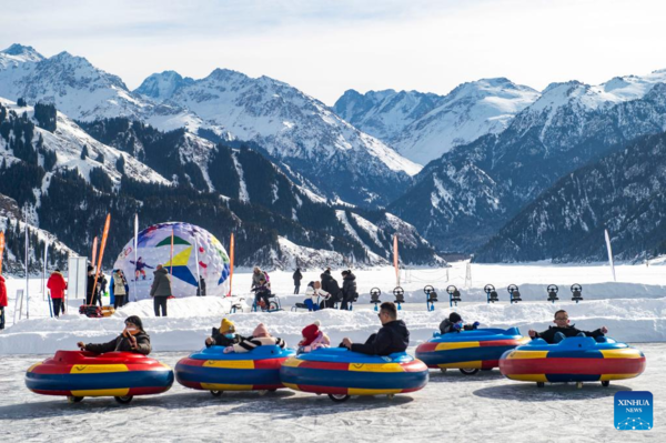 Chinese Scenic Spots Welcome Tourists with Festive Activities During Spring Festival Holiday