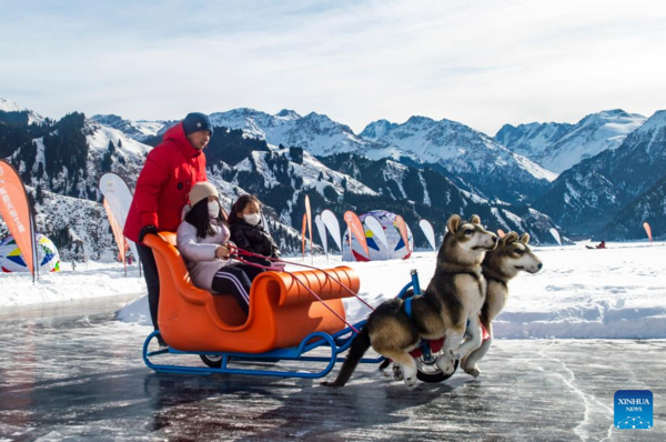 Chinese Scenic Spots Welcome Tourists with Festive Activities During Spring Festival Holiday