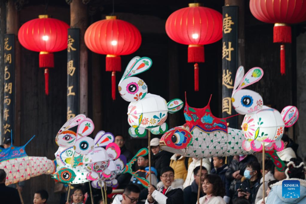 Tourists Take Part in Lantern Parade to Celebrate Chinese New Year in E China's Anhui