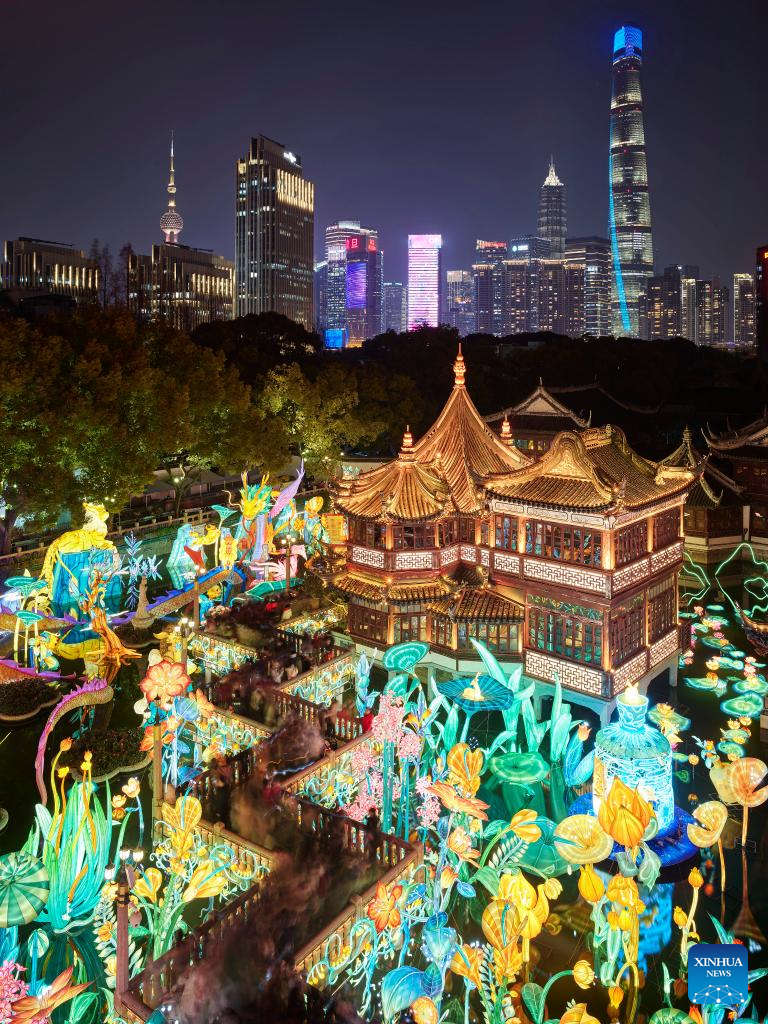 People Watch Lantern Show at Yu Garden in Shanghai