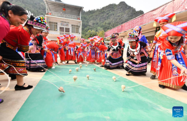 Spinning Top Competition Held to Celebrate Upcoming Int'l Women's Day in S China's Guangxi