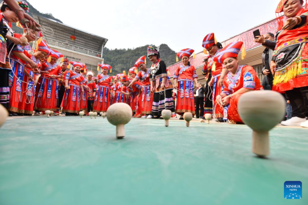 Spining Top Competition Held to Celebrate Upcoming Int'l Women's Day in S China's Guangxi