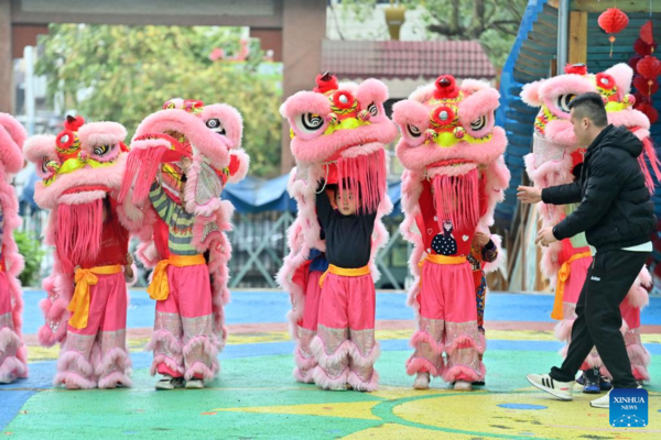 Lion Dance Integrated with School Education in Tengxian, S China