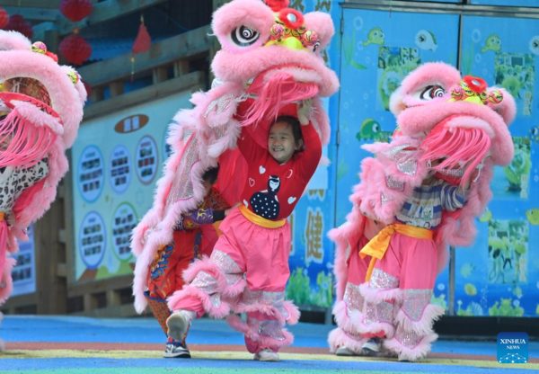 Lion Dance Integrated with School Education in Tengxian, S China