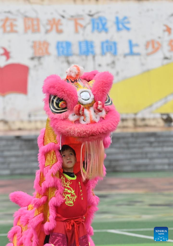 Lion Dance Integrated with School Education in Tengxian, S China